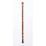 A Chinese bamboo carved walking cane, carved with various animals from Chinese mythology and the
