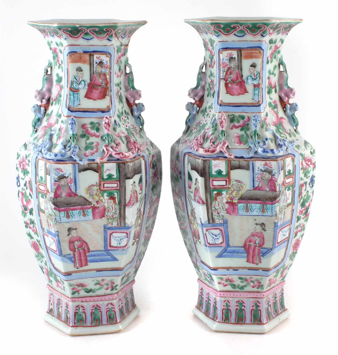 Pair of Cantonese hexagonal vases decorated with Chinese figures in interior scenes, applied dog and