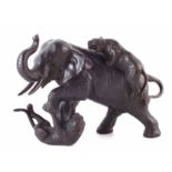 Japanese bronze elephant and tiger group, seal mark to base, Meiji period, late 19th century, 19cm