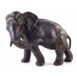 Japanese spelter model of an elephant, early 20th century, seal mark to underside, 20cm high.