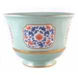 Chinese jardinière, painted with blue and red lotus flowers within panels on a celadon ground,