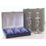 A pair of Waterford seahorse candlesticks and a cased set of Mappin & Webb tumblers We cannot do