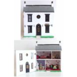 A Dolls house with five rooms, single door opening complete with furnishings and figures We cannot