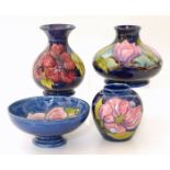 Two Moorcroft vases, a ginger jar base and a bowl (chip)