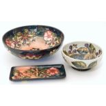 A Moorcroft brambles bowl together with another bowl and rectangular tray (all with silver 2nds