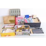 Large accumulation of stamp collecting accessories covering a wide range of products.