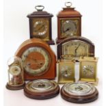 J & M Perkins mantel clock, six other mantel clocks and two horseshoe shaped aneroid barometers.