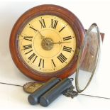 Postman's wall clock. With two brass weights and alarm striking on single bell. 14in diameter.