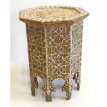 Late 19th century Moroccan painted pine table with fretwork decoration, 41cm high. Unfortunately