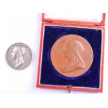 Queen Victoria 1838 Coronation silver medal and Queen Victoria Diamond Jubilee 1897 bronze medal.