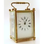 Brass carriage clock, striking on single gong. Unfortunately we are not doing condition reports