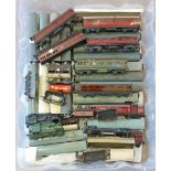 A collection of OO gauge model railway items including twenty-eight tin plate coaches, twelve