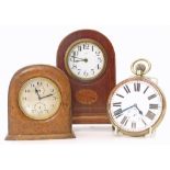 Two mantel clocks and one Goliath pocket watch. One Edwardian with patera inlay, one with leather