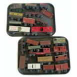 Twenty-four O gauge tin plate model railway items of rolling stock Unfortunately we are not doing