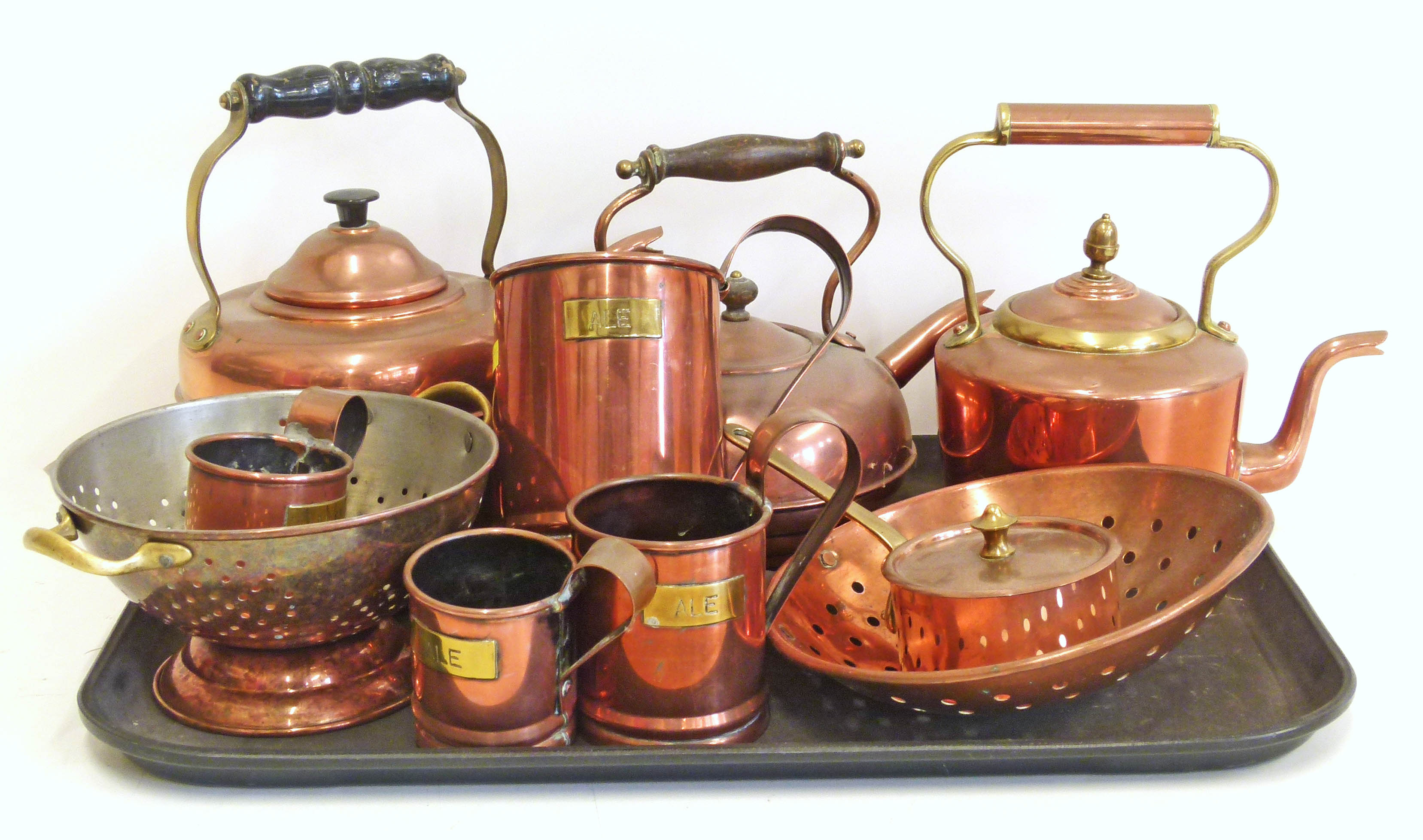 Three copper kettles, Four copper ale measures, copper colander, miniature Williams Sondma