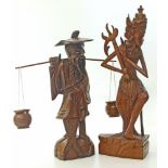 Two hardwood Indonesian carved figures Unfortunately we are not doing condition reports for this