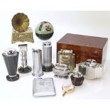 Twelve novelty cigarette lighters and a mahogany humidor Unfortunately we are not doing condition