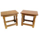 Robert "Mouseman" Thompson two matching occasional tables or stools, each with adzed rectangular top