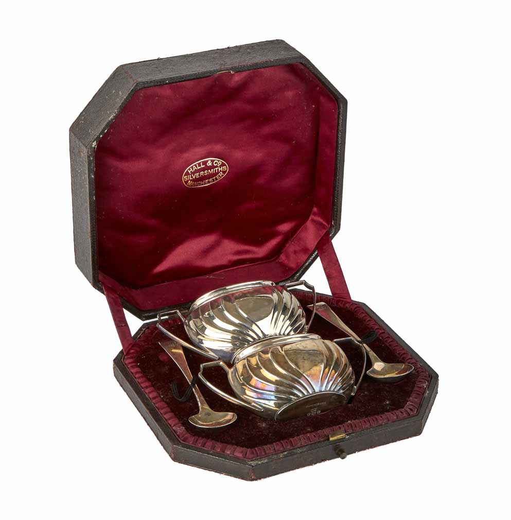 Pair of cased silver bon-bon dishes, chippendale border surrounds with pierced scrolling decoration,