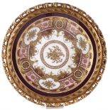 English porcelain plaque finely decorated with raised paste gilding and enamel work, 27cm diameter