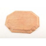 Robert "Mouseman" Thompson bread board, rectangular shape with cut corners, traditional trademark