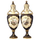 Pair of Coalport twin handled lidded vases circa 1900 signed P.Simpson, painted with a Scottish loch