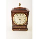 A Regency period mahogany mantel clock by Thomas Richards of London. With stepped quadripartite top,