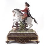 Capodimonte Musketeer signed Tyche , modelled riding on horseback with a cockerel at the base,
