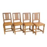 Robert "Mouseman" Thompson four single dining chairs, lattice splat back, leather close nailed seat,