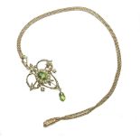 Edwardian peridot and seed pearl 9ct brooch pendant on chain, central oval peridot measuring approx.