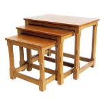 Robert "Mouseman" Thompson nest of three tables, each table with adzed finished top, standing on
