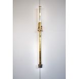 An early 20th century brass ships stick barometer by F. Darton & Co (Watford, England). With