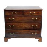 George III mahogany chest of two short and three long graduated drawers, rectangular top with ogee