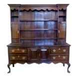 Victorian oak mahogany cross-banded North West regional dresser, inverted plate rack, dentil