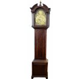 An 18th century mahogany longcase clock by William Musgrave of Leeds. With broken arched pediment