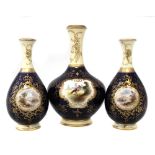 Pair of Coalport vases circa 1900 signed E.O.Ball, painted with a scenes of Loch Earn and Loch Tay