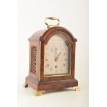 An 18th century mahogany bracket clock by Edmund Poole*, Limehouse, London. The case with arched