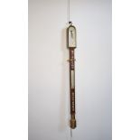 An early 19th century rosewood ships stick barometer by Spencer, Browning & Co. The rosewood case