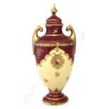 Coalport twin handled lidded vase circa 1900 , painted with a scene of Inverlochy Castle, within a