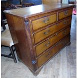 A George III oak and cross banded chest of two short and three long drawers Unfortunately we are not