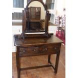 Ercol dark elm two-drawer side/dressing table complete with swing frame toilet mirror, 91cm wide,