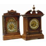 Two oak mantel clocks, two-train movements, both striking on single gong. Unfortunately we are not