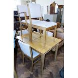 A Gordon Russell (Broadway) extending dining table and five chairs (one carver) Unfortunately we are