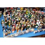 A large collection of over 200 alcohol miniature bottles, encompassing a wide variety of liquors and