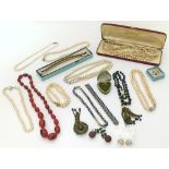 Assorted costume jewellery, including necklaces, brooches etc. Unfortunately we are not doing