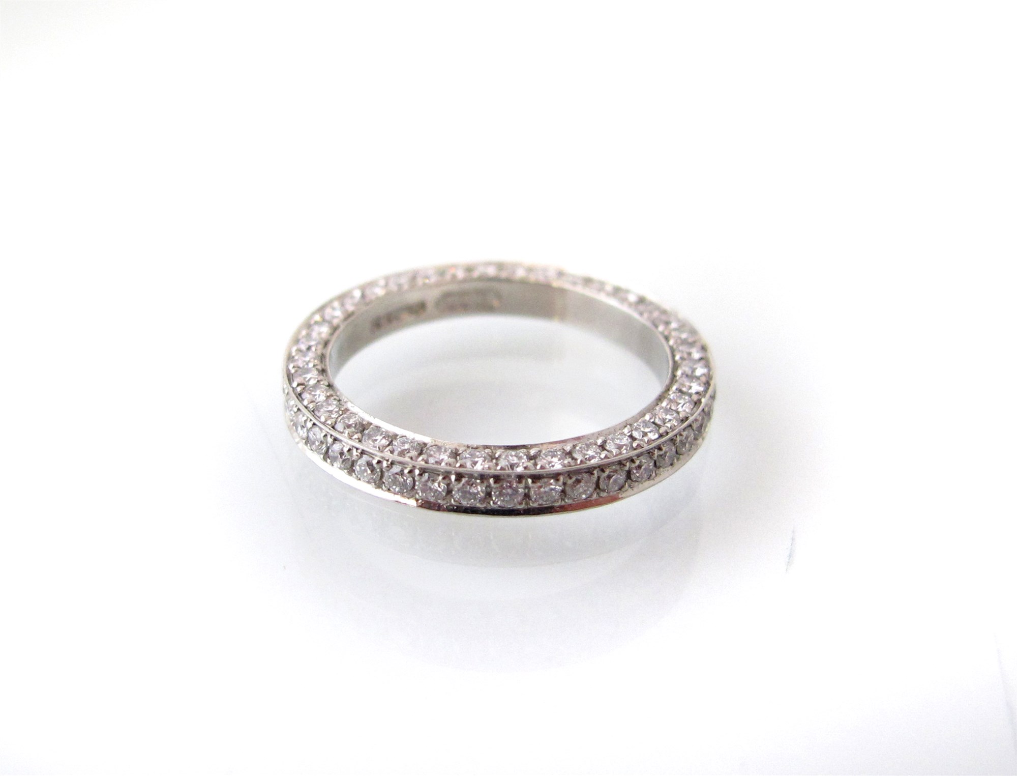 Platinum and diamond full eternity ring approx. 1ct of diamonds in total, ring size J. Condition