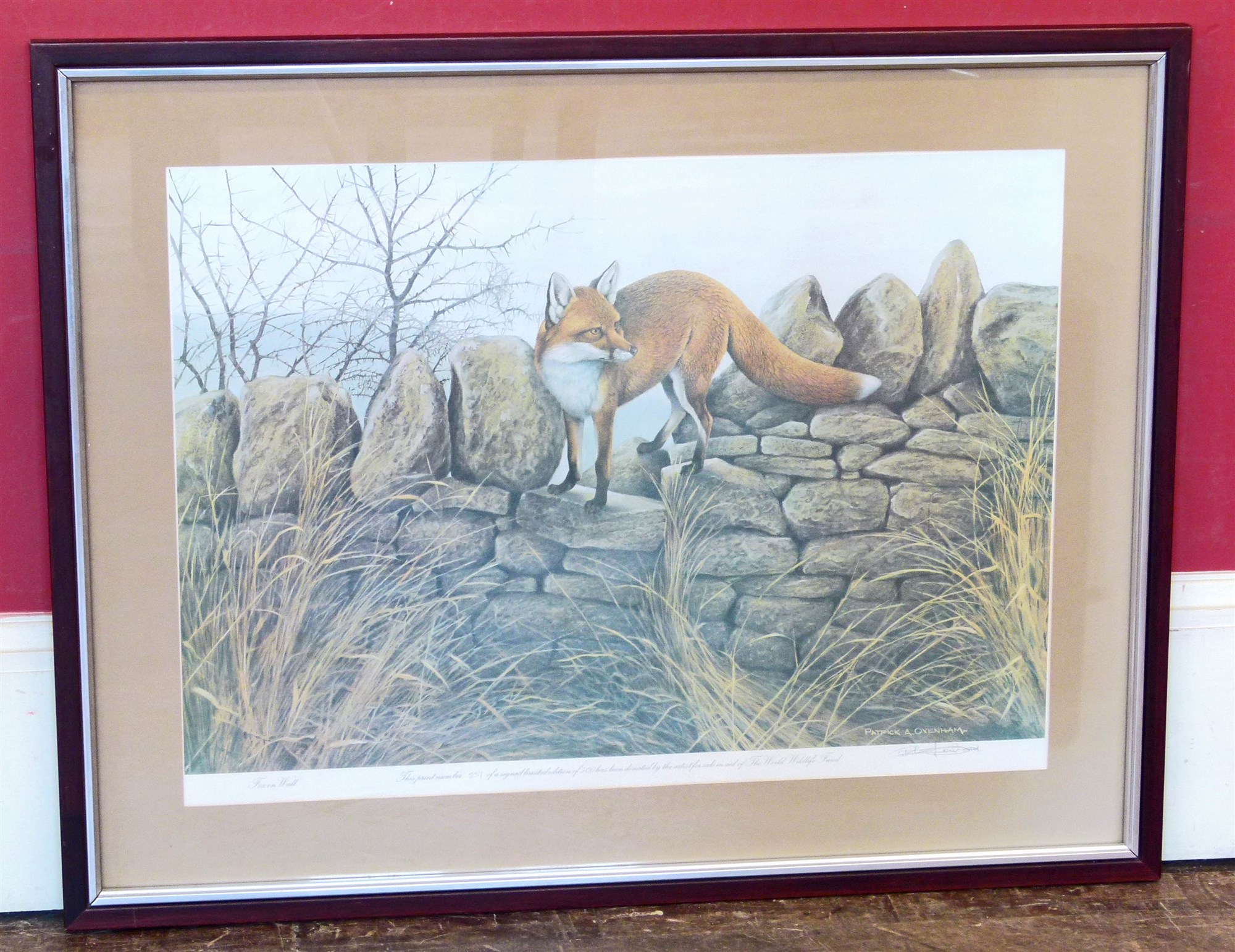 Signed limited edition print "Fox on Wall" after Patrick A. Oxenham. Unfortunately we are not