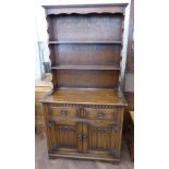 A reproduction oak dresser complete with plate rack 93cm wide Unfortunately we are not doing