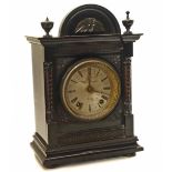 A 19th century ebonised mantle clock, striking on a single gong Unfortunately we are not doing