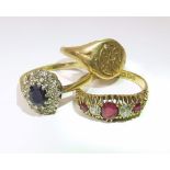 A sapphire and diamond cluster ring, a ruby and diamond ring and a yellow gold signet ring